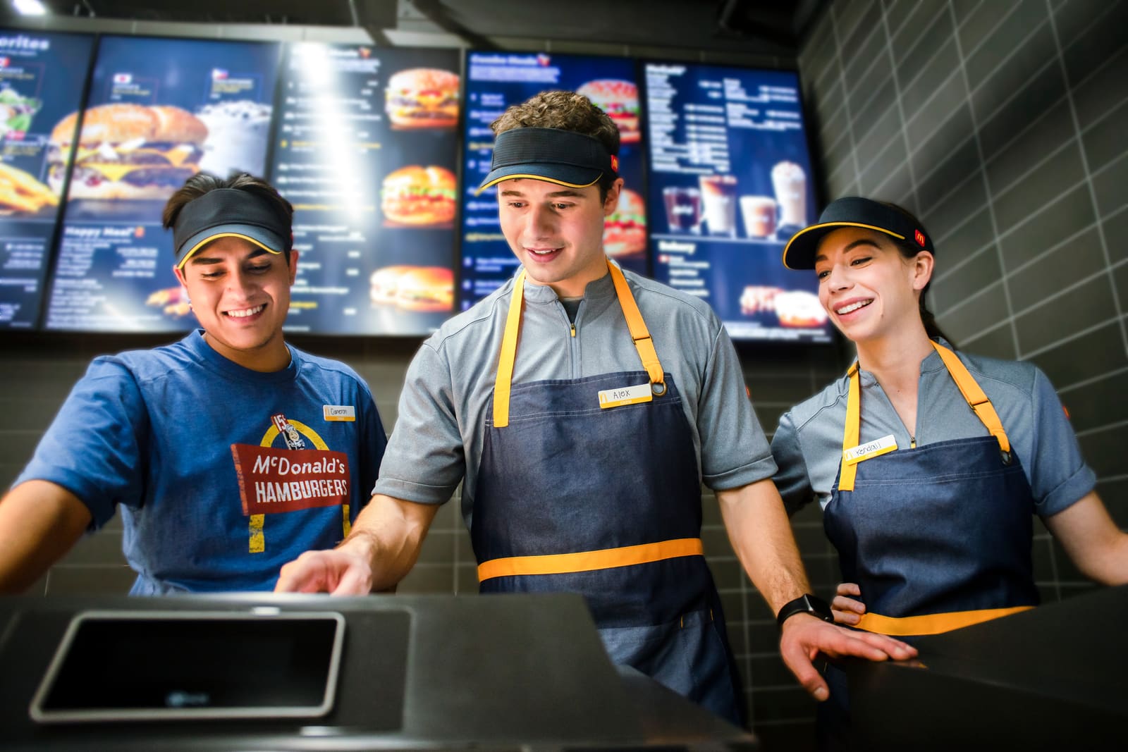 Three Arch Fellow crew members at the front counter